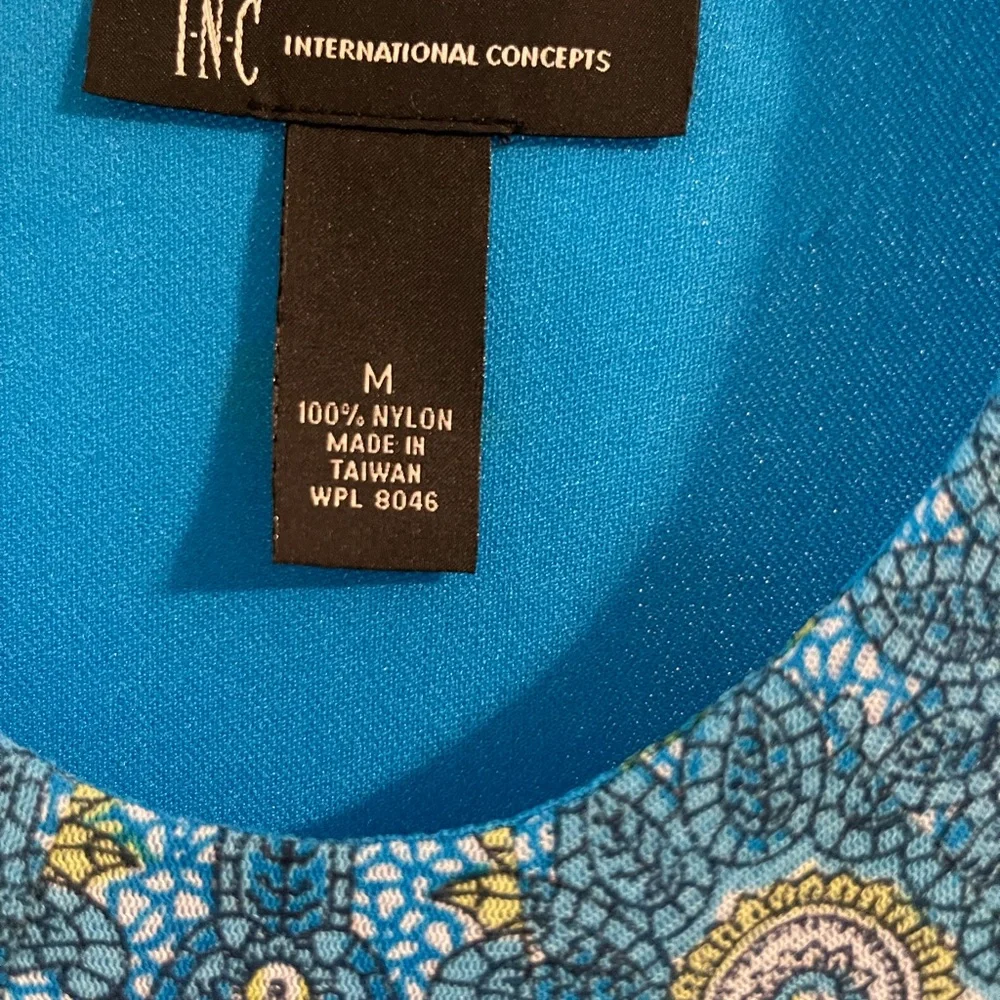 Beautiful top, looks great under a jacket or on its own. 100% nylon size Medium - Picture 4 of 4